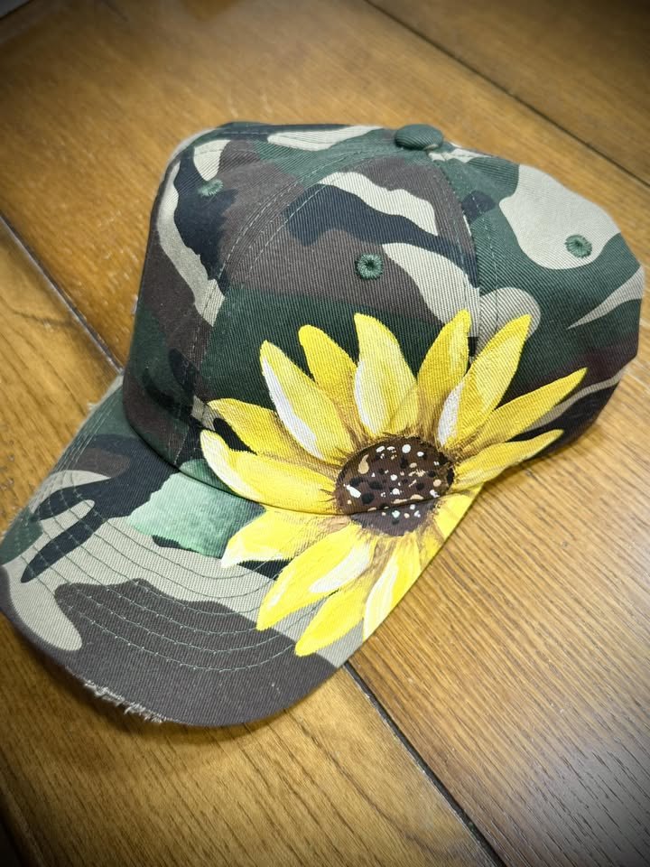 Camo ball cap with a hand-painted sunflower