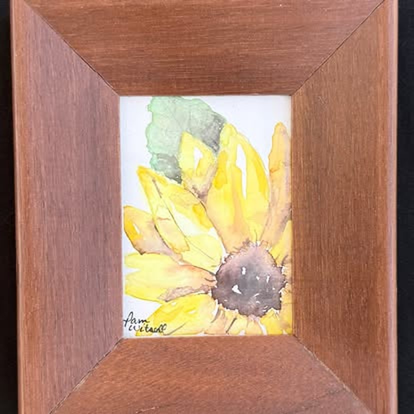 Framed watercolor of a sunflower